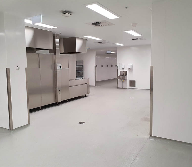 New commercial kitchen cladded with Inteviron's hygienic wall cladding